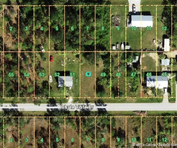 a view of a brick house with a large windows