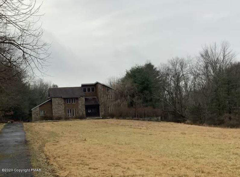 400 Blue Ridge Road Saylorsburg, PA 18353 - Photo 3 of 13 a view of house with large trees