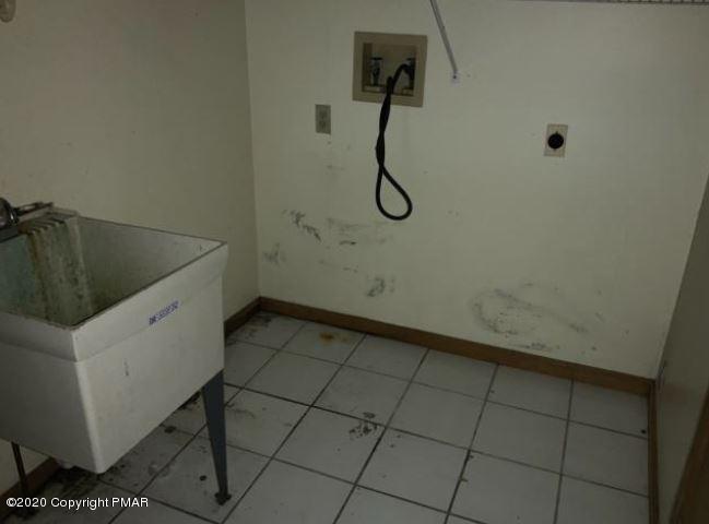 400 Blue Ridge Road Saylorsburg, PA 18353 - Photo 8 of 13 a bathroom with a sink and a shower