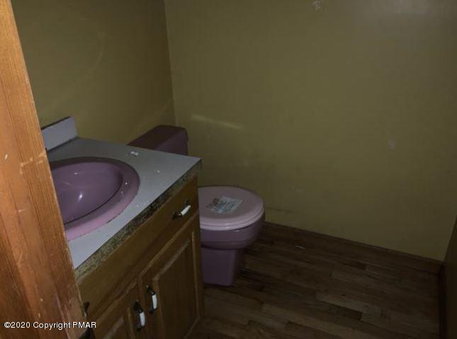 400 Blue Ridge Road Saylorsburg, PA 18353 - Photo 9 of 13 a bathroom with a toilet and a sink