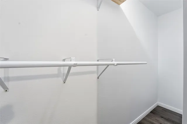 a view of small space with racks on the wall