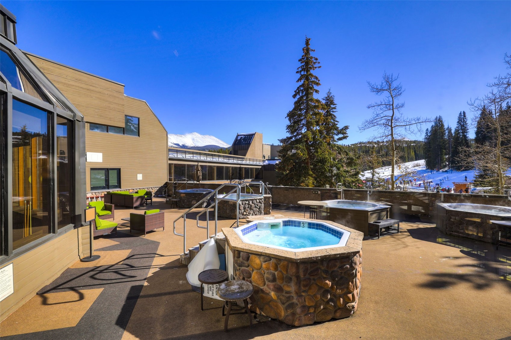 631 Village Road, Unit 31460 Breckenridge, CO 80424 - Photo 13 of 20 a view of a swimming pool with a patio