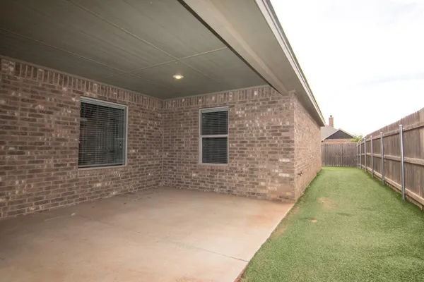 a view of backyard of house