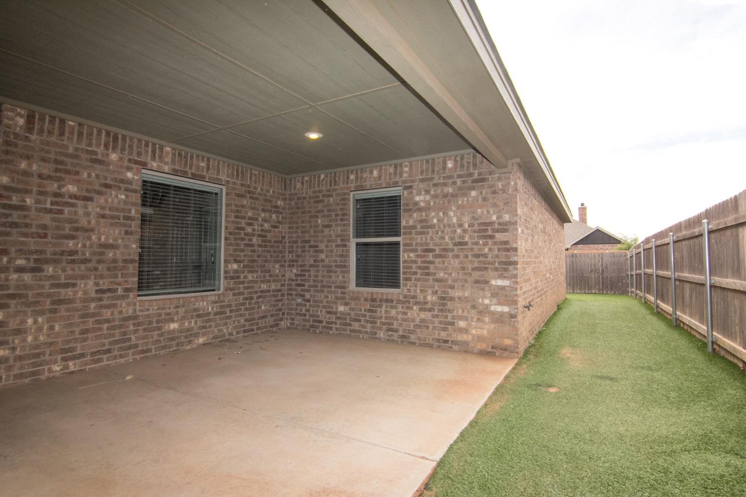 3821 133rd Street Lubbock, TX 79423 - Photo 10 of 15 a view of backyard of house