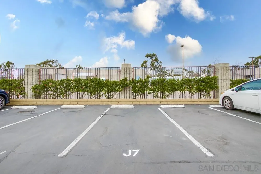 3583 Ruffin Road, Unit 209 San Diego, CA 92123 - Photo 29 of 39 a view of a street with a cars park side of road