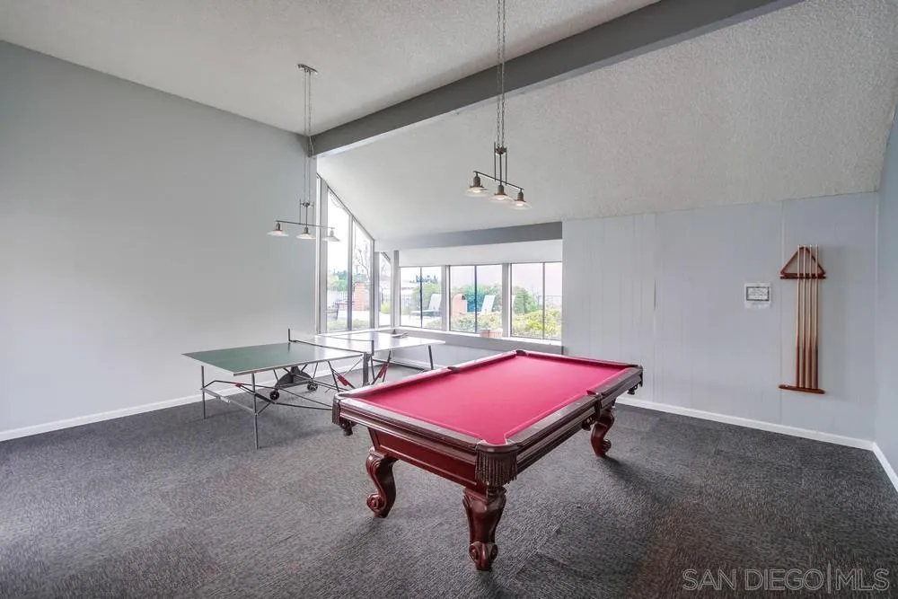 3583 Ruffin Road, Unit 209 San Diego, CA 92123 - Photo 32 of 39 a room with pool table and windows