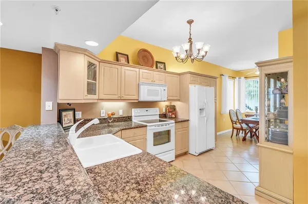 $439,999 | 2365 Hidden Lake Court, Unit 8001, Naples, FL 34112