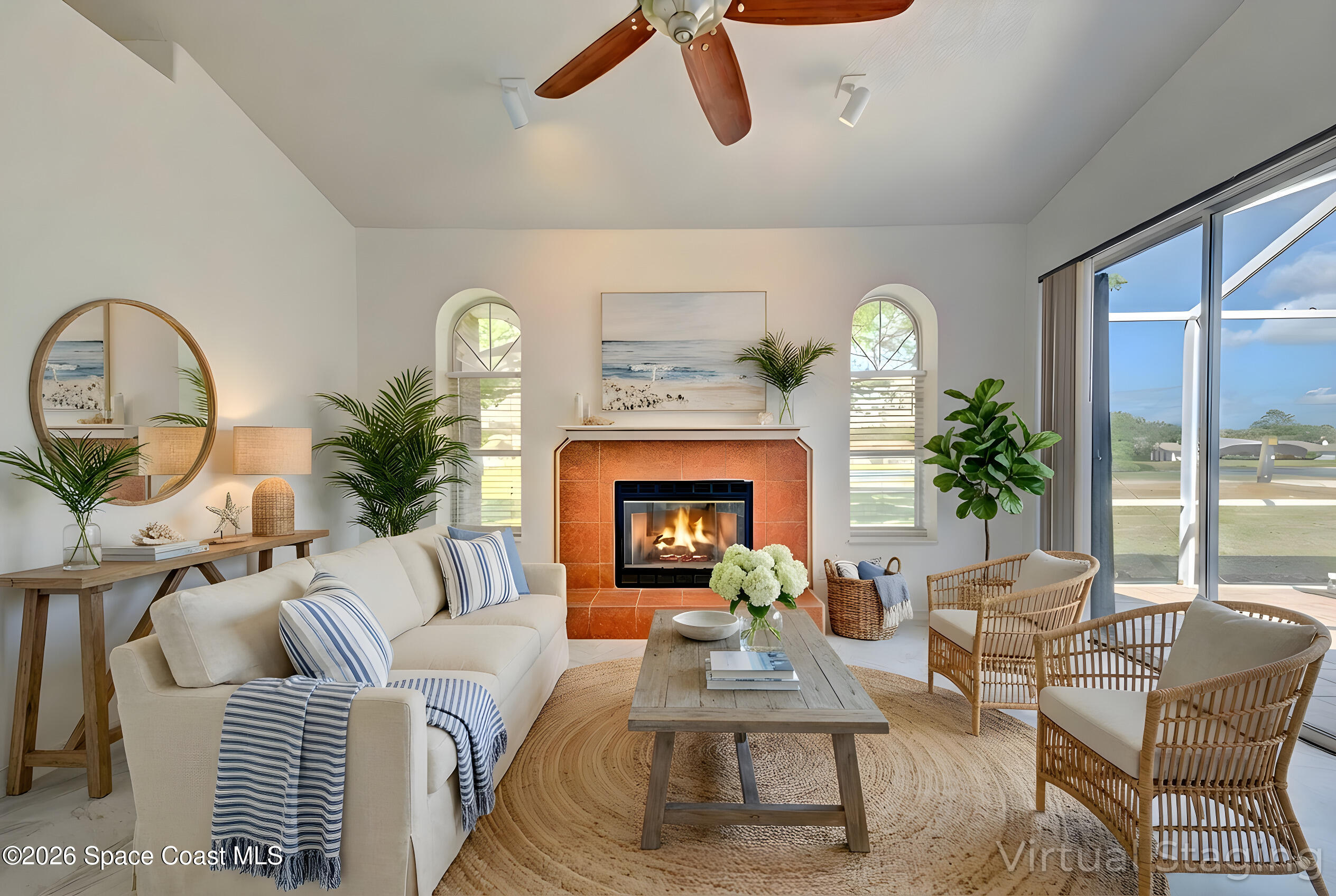 4065 Sand Ridge Drive Merritt Island, FL 32953 - Photo 16 of 59 a living room with furniture and a fireplace