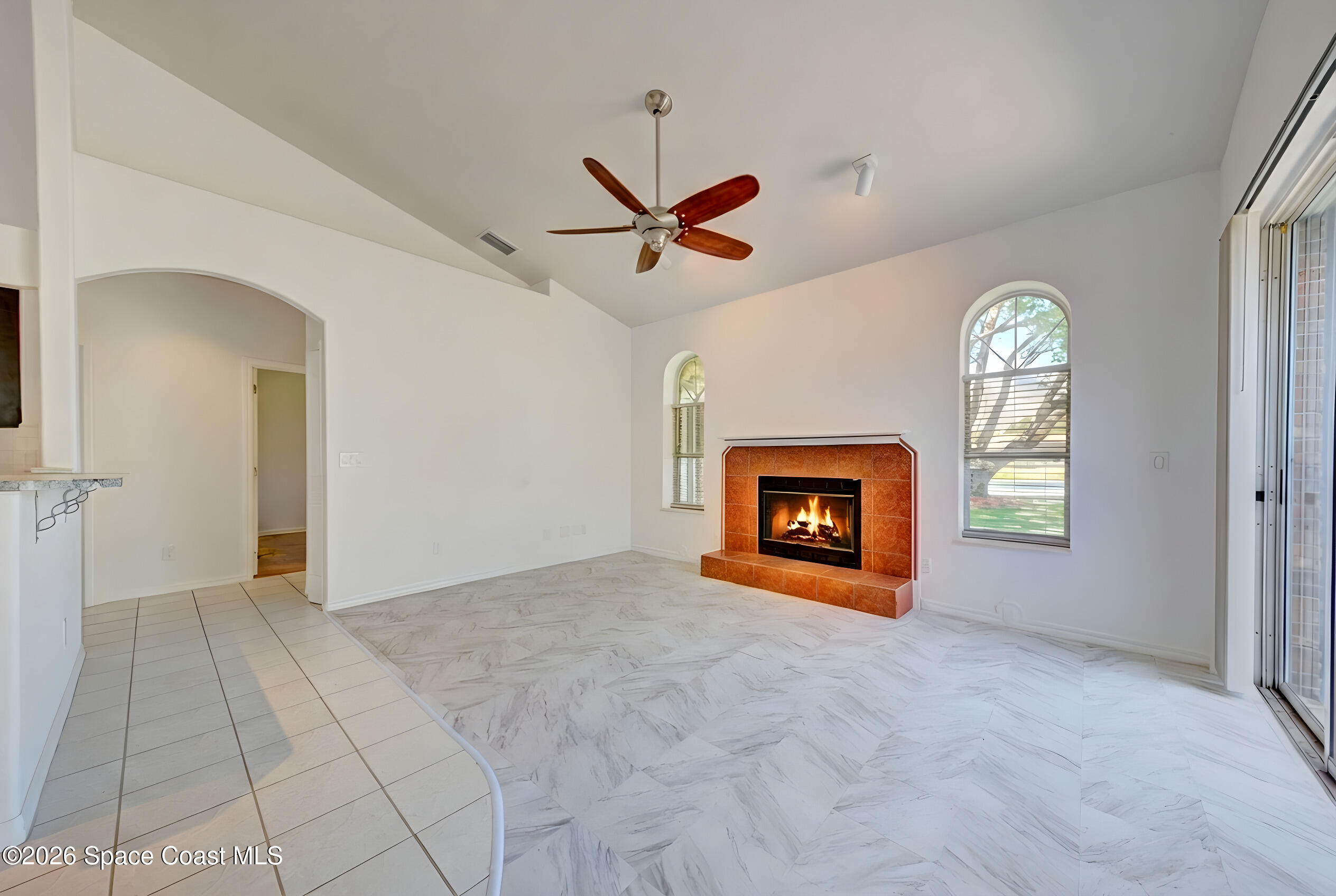 4065 Sand Ridge Drive Merritt Island, FL 32953 - Photo 18 of 59 wooden floor with a fireplace in it