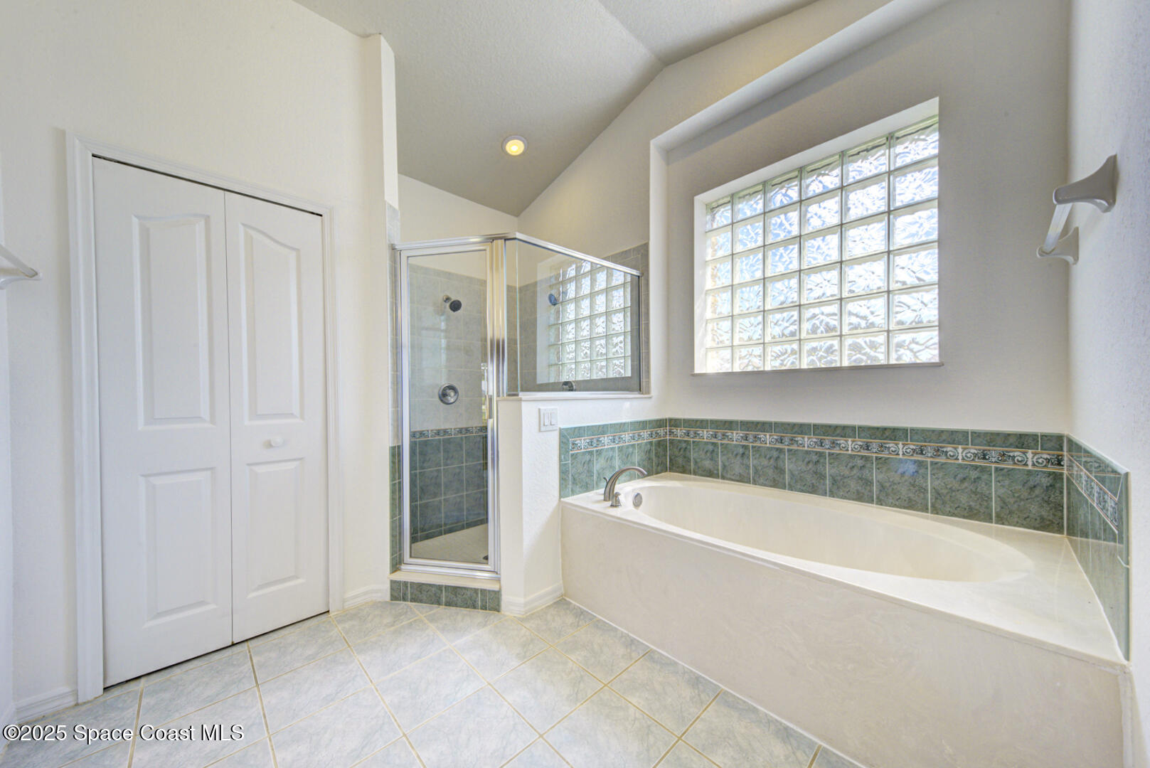 4065 Sand Ridge Drive Merritt Island, FL 32953 - Photo 23 of 59 a white bath tub sitting next to a white tub