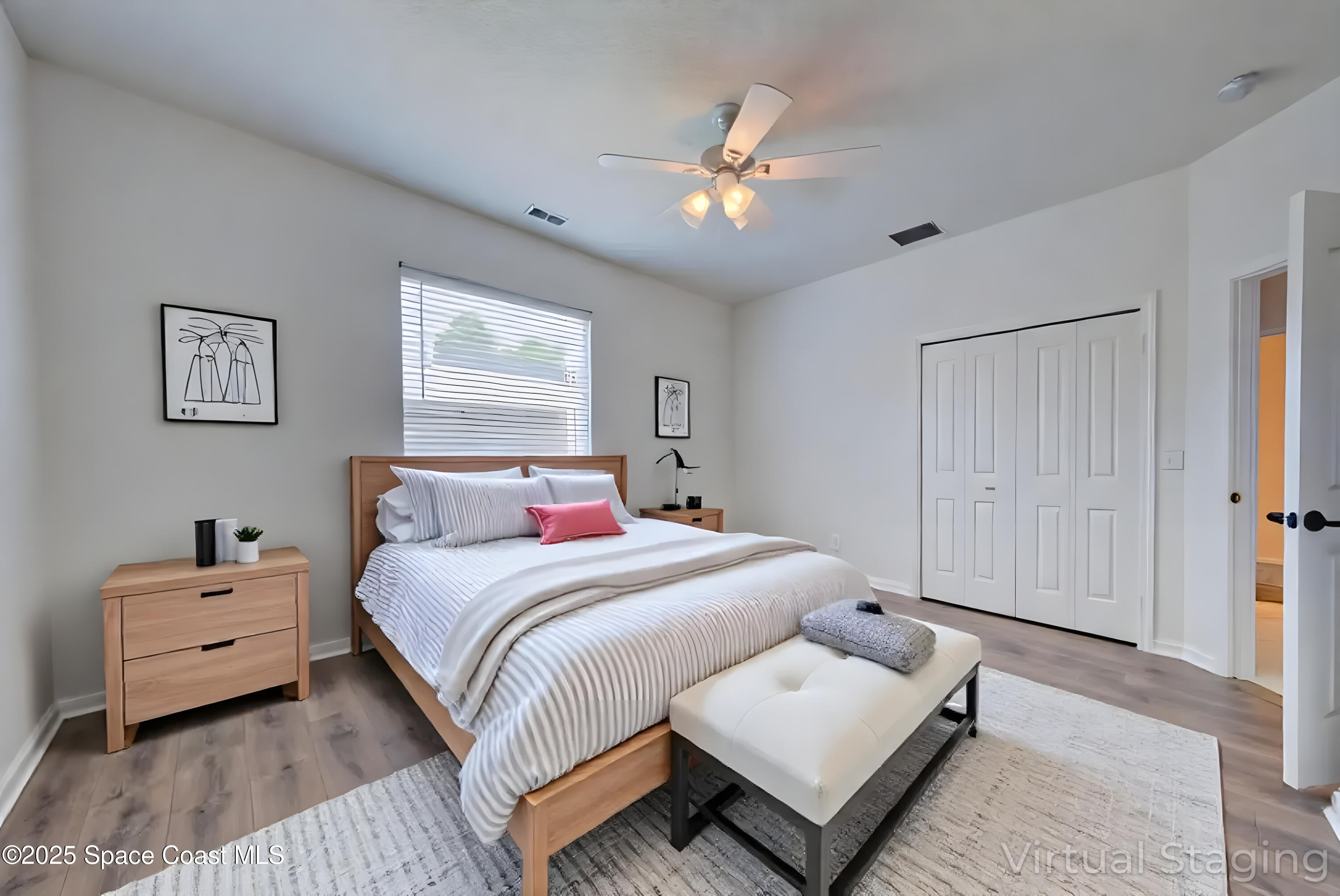 4065 Sand Ridge Drive Merritt Island, FL 32953 - Photo 29 of 59 a bedroom with a bed and a night stand