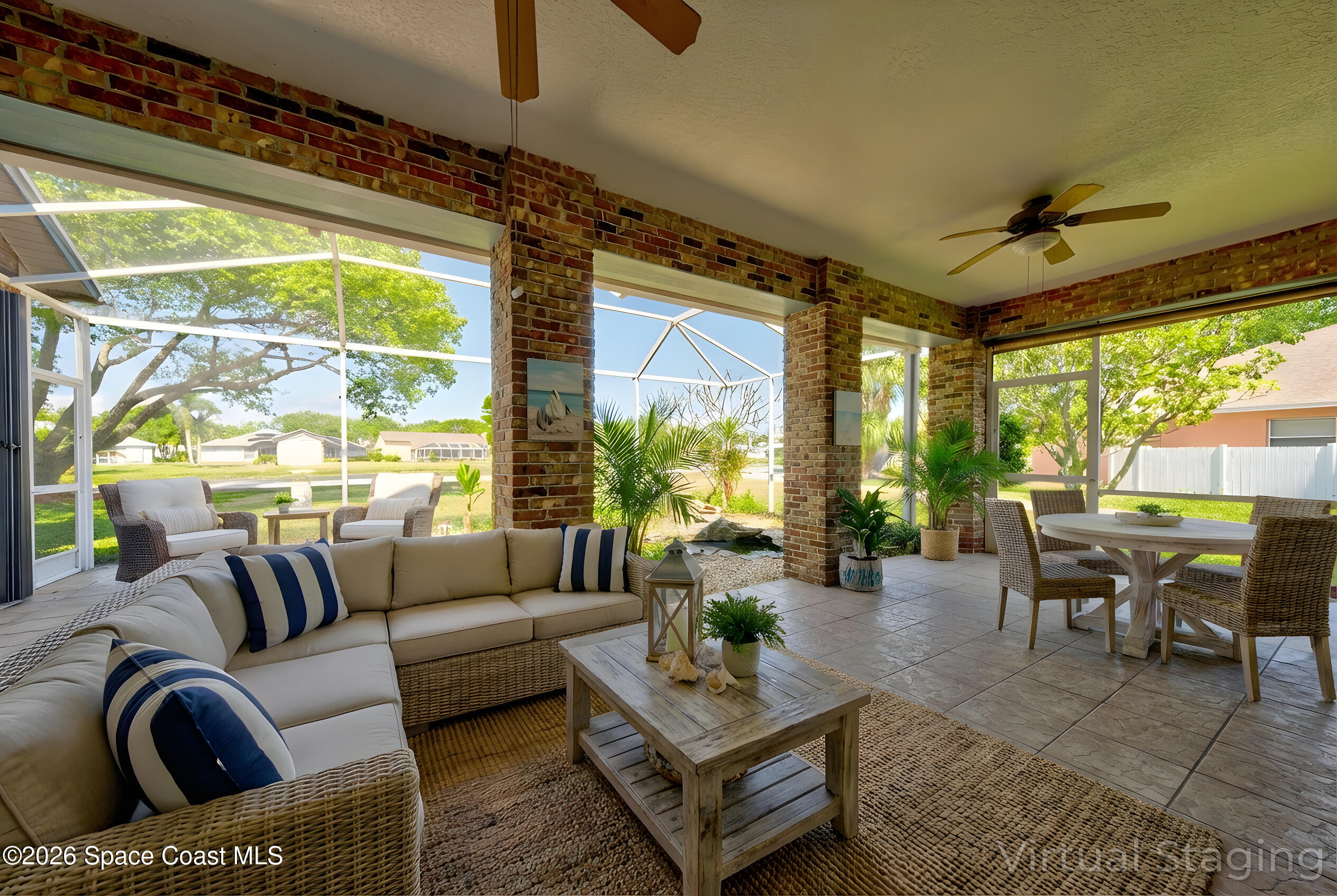 4065 Sand Ridge Drive Merritt Island, FL 32953 - Photo 37 of 59 a living room with furniture a lamp and a large window