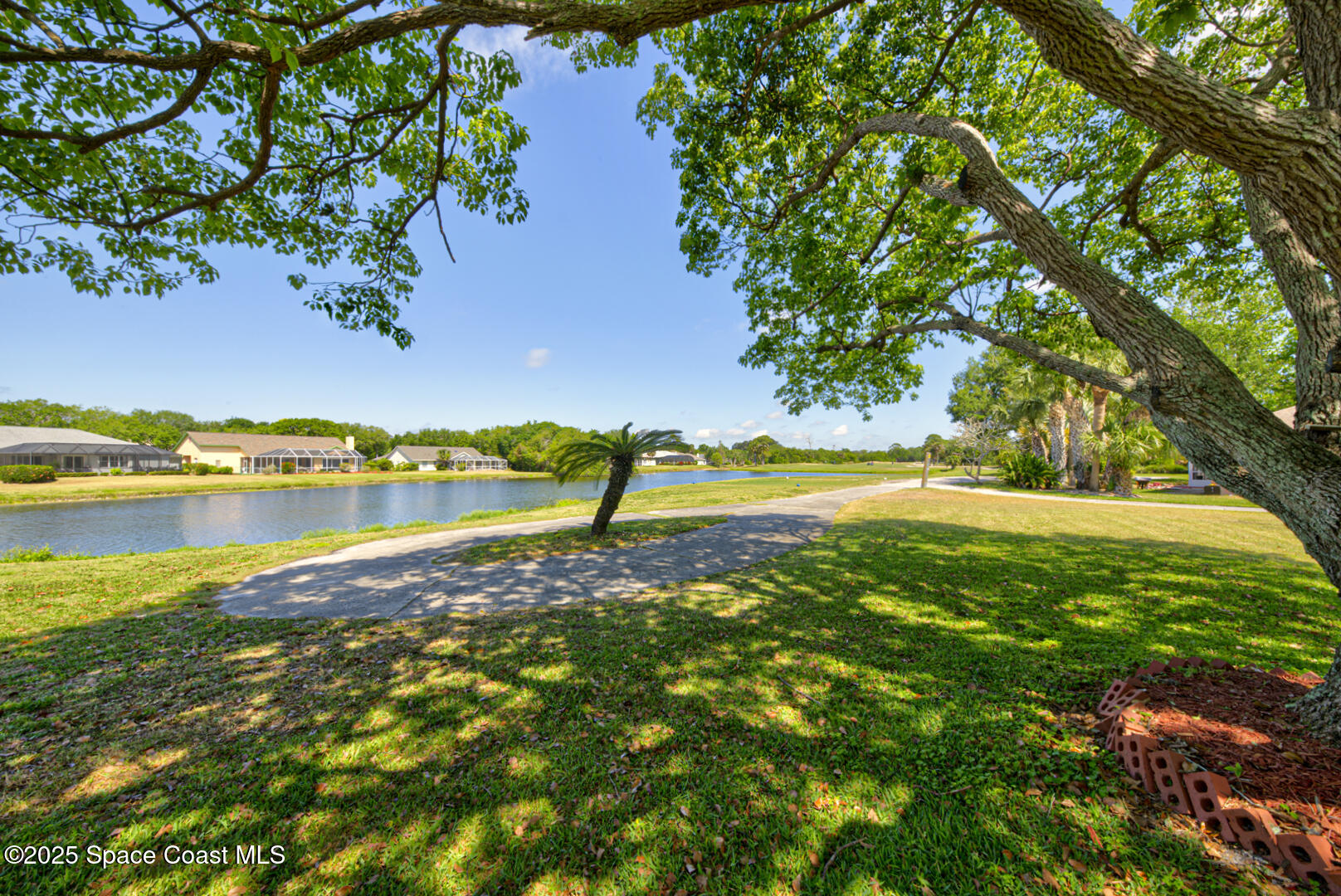 4065 Sand Ridge Drive Merritt Island, FL 32953 - Photo 47 of 59 backyard on golf course