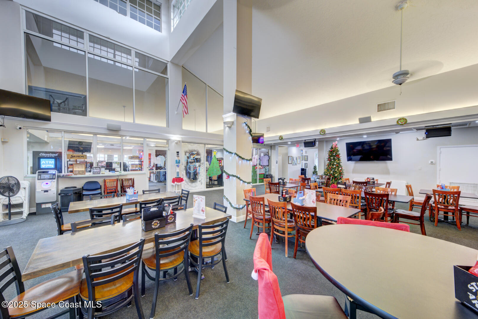 4065 Sand Ridge Drive Merritt Island, FL 32953 - Photo 53 of 59 a group of people sitting in a living room