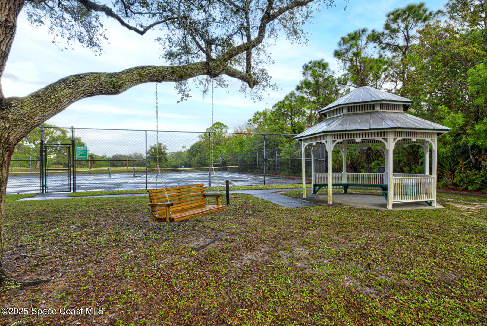 4065 Sand Ridge Drive Merritt Island, FL 32953 - Photo 57 of 59 a view of a house with a yard