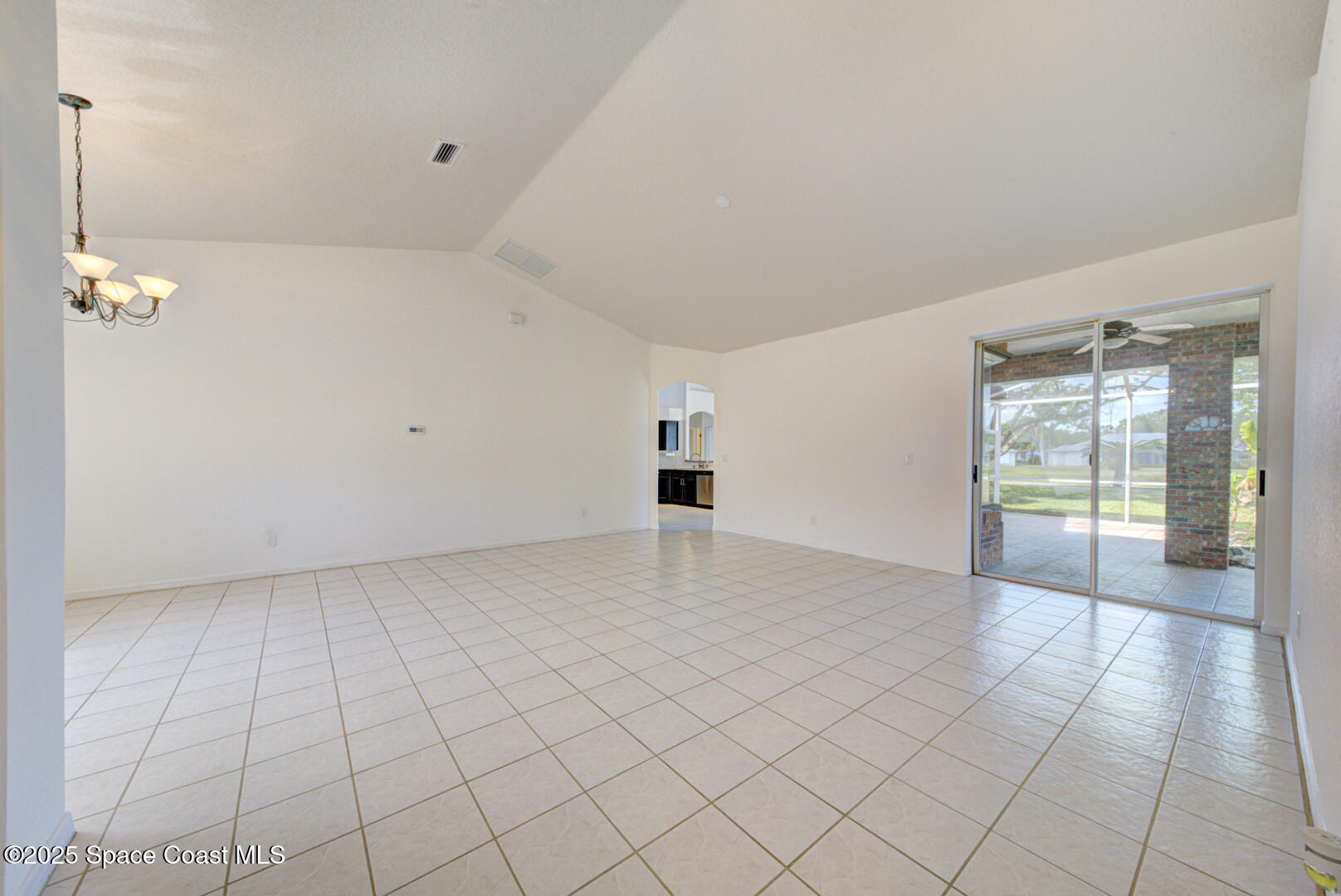 4065 Sand Ridge Drive Merritt Island, FL 32953 - Photo 7 of 59 an empty room with windows