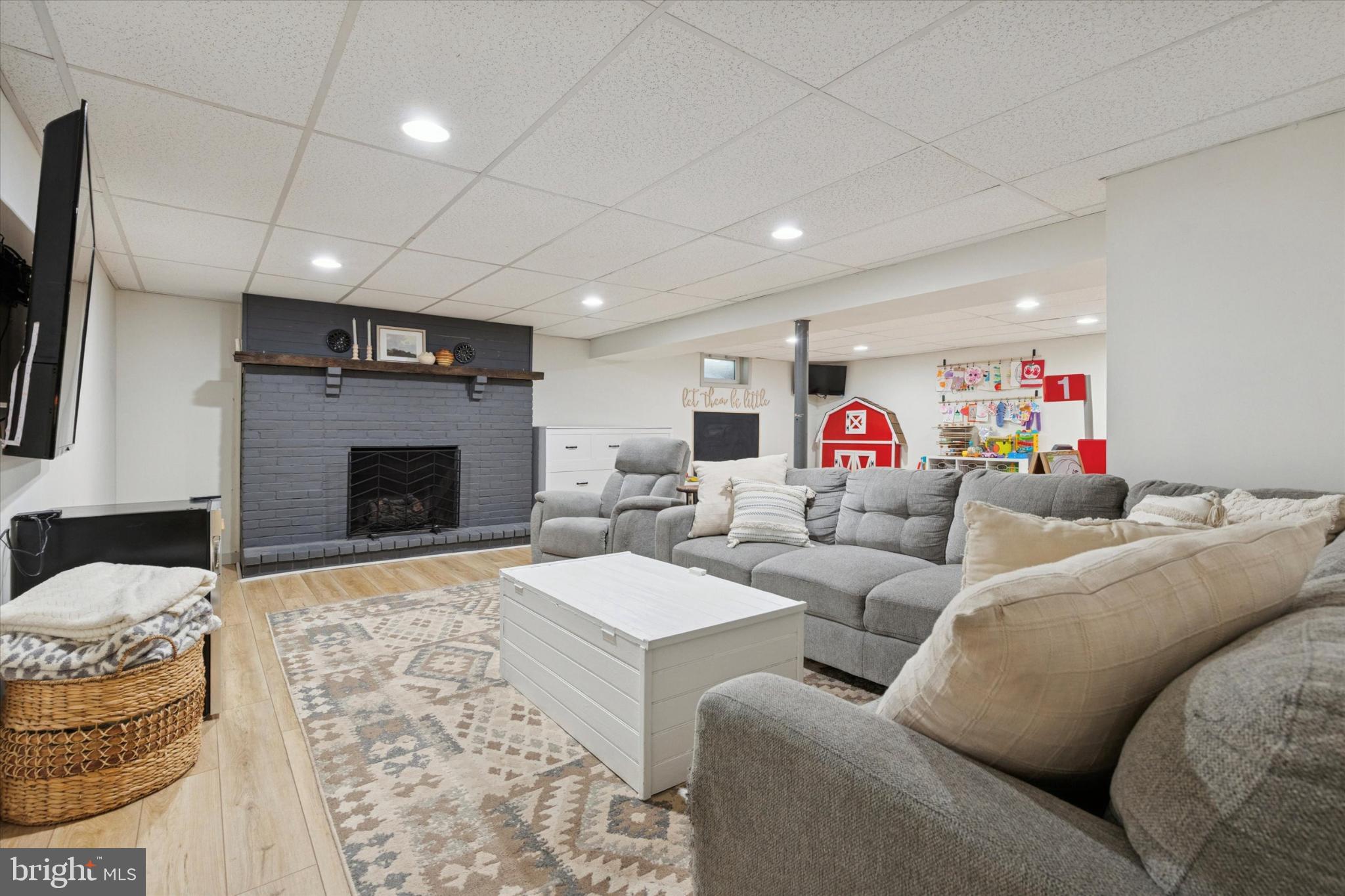 673 Barrington Road Collegeville, PA 19426 - Photo 19 of 28 Cozy basement with working gas fireplace