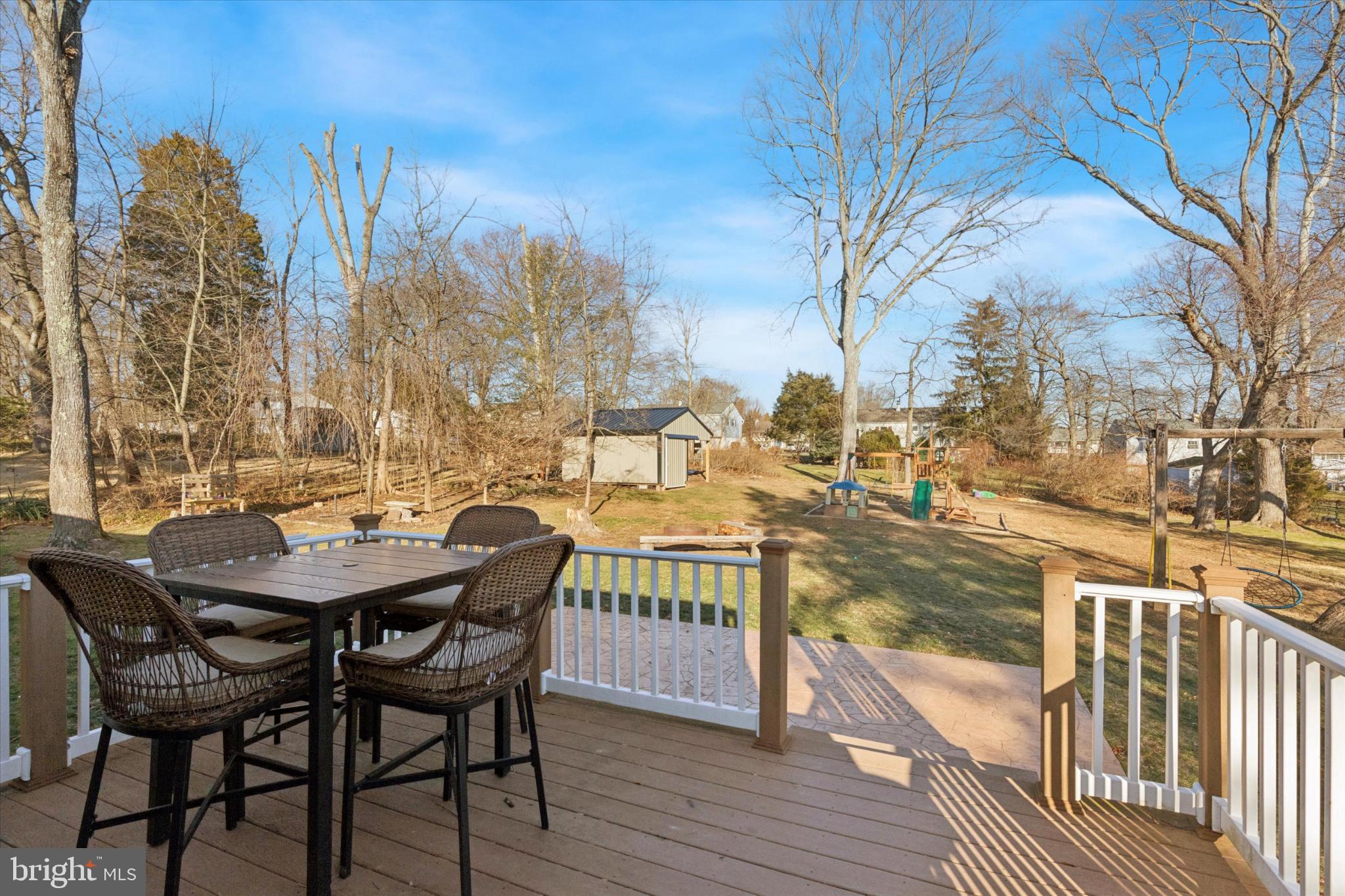 673 Barrington Road Collegeville, PA 19426 - Photo 23 of 28 Deck off back of house with stamped concrete patio
