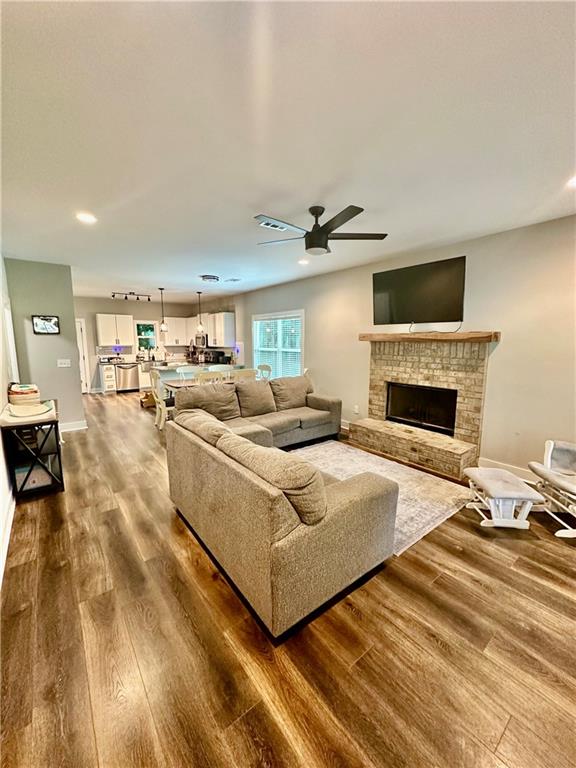 815 Poplar Street Monticello, GA 31064 - Photo 5 of 33 a living room with furniture and a fireplace
