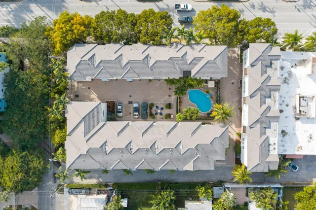 a view of a swimming pool with a patio