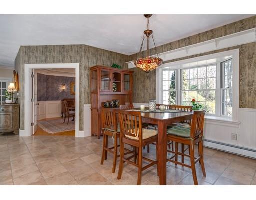 45 Chapin Road Holden, MA 01520 - Photo 6 of 28 a dining room with a wooden table and chairs