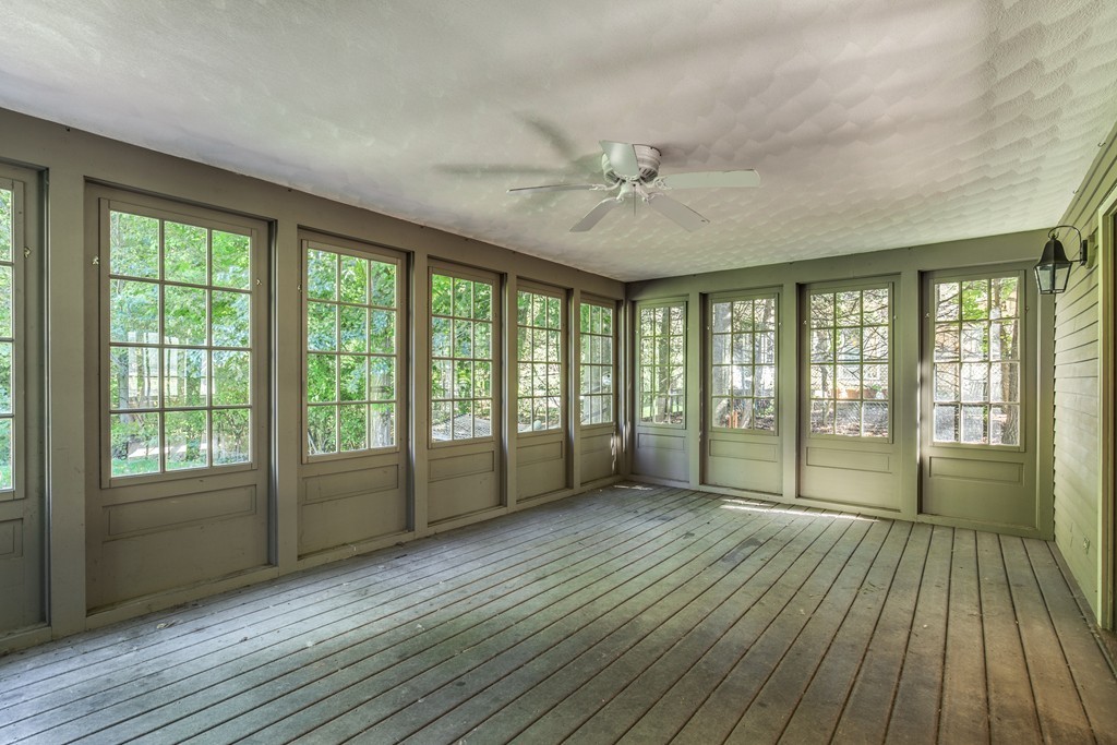 34 Leslie Road Winchester, MA 01890 - Photo 12 of 26 a view of an empty room with wooden floor and a window