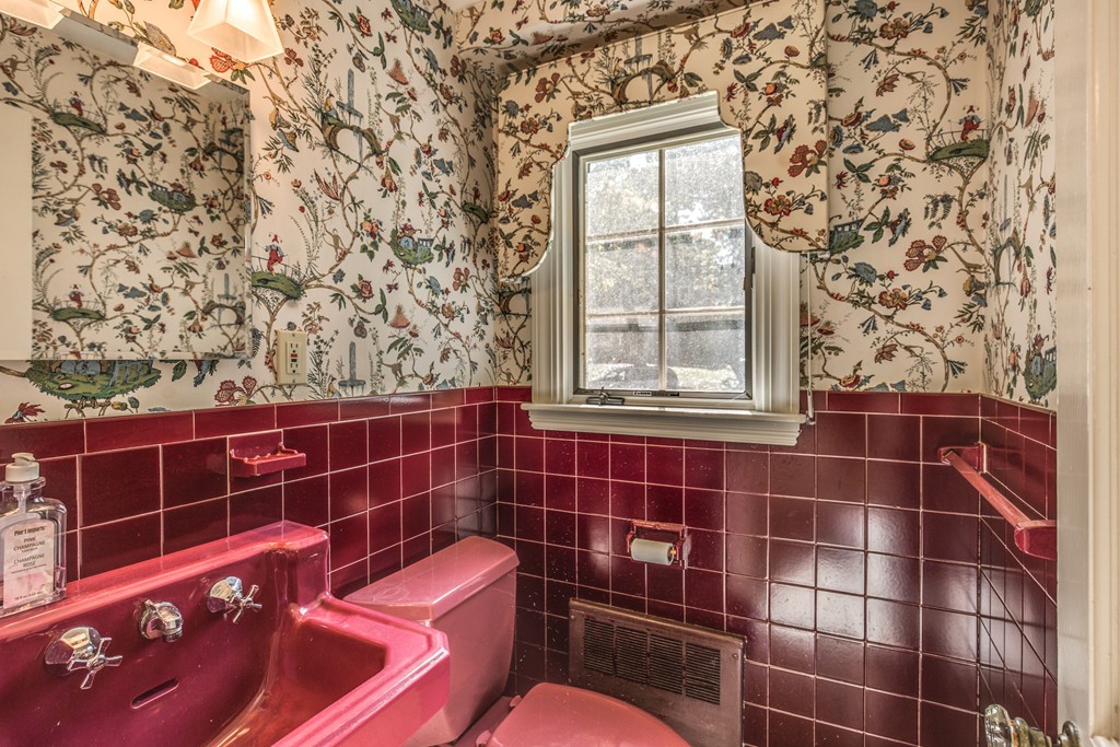 34 Leslie Road Winchester, MA 01890 - Photo 13 of 26 a bathroom with a sink and toilet