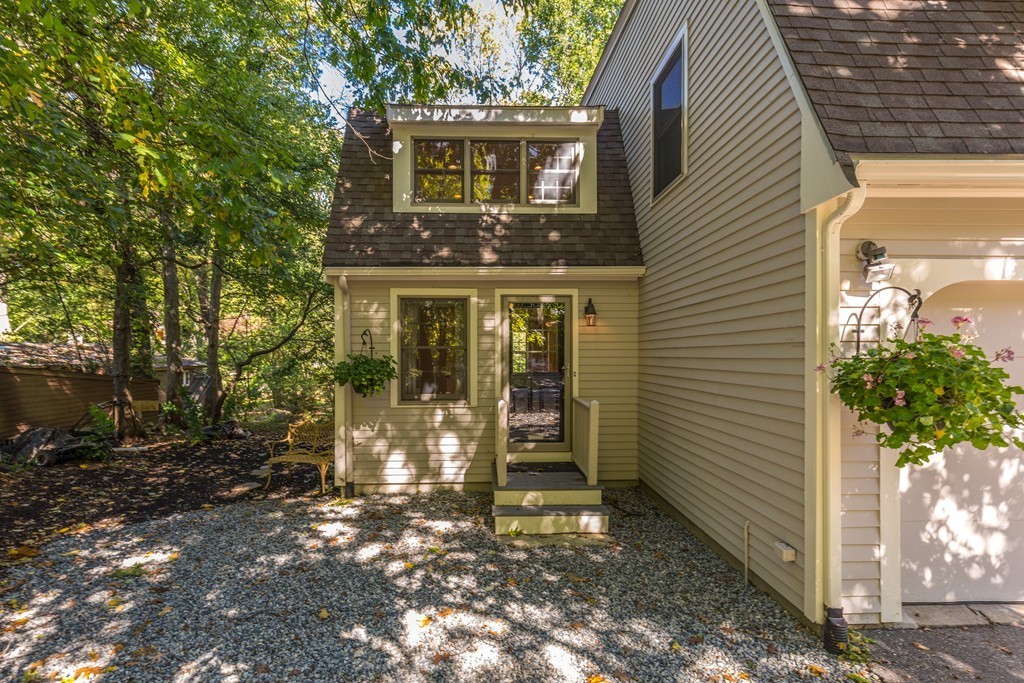 34 Leslie Road Winchester, MA 01890 - Photo 15 of 26 a front view of a house with a tree