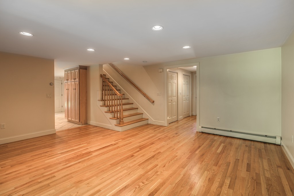 34 Leslie Road Winchester, MA 01890 - Photo 18 of 26 a view of an empty room with wooden floor