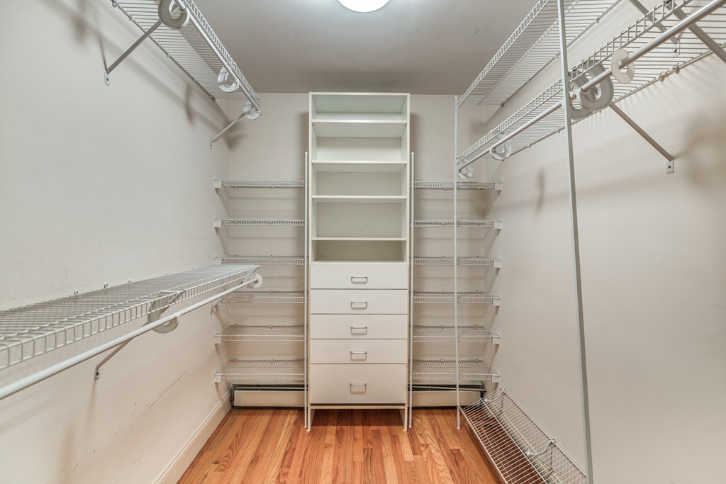 34 Leslie Road Winchester, MA 01890 - Photo 24 of 26 a view of walk in closet with empty racks