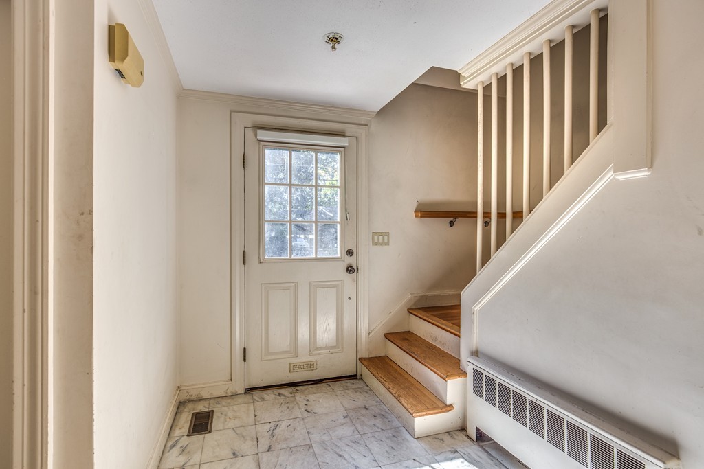 34 Leslie Road Winchester, MA 01890 - Photo 4 of 26 a view of an entryway with workspace