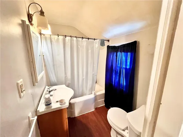 a bedroom with bed and a closet