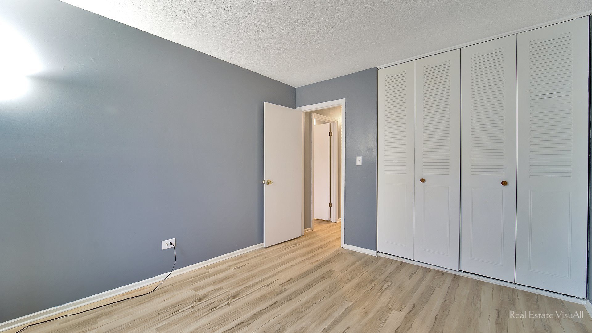 1452 Inverrary Lane Deerfield, IL 60015 - Photo 11 of 16 a view of an empty room with wooden floor