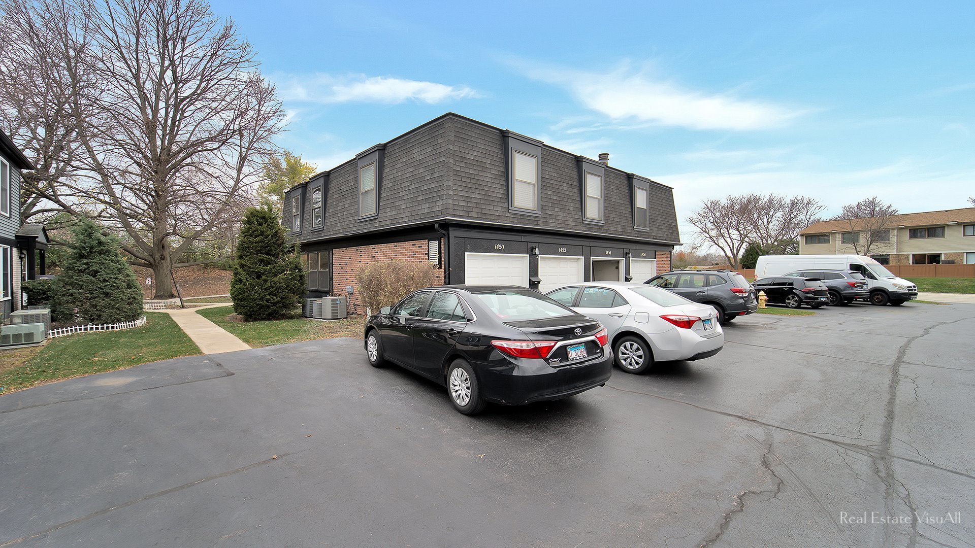 1452 Inverrary Lane Deerfield, IL 60015 - Photo 2 of 16 a car parked in front of a house