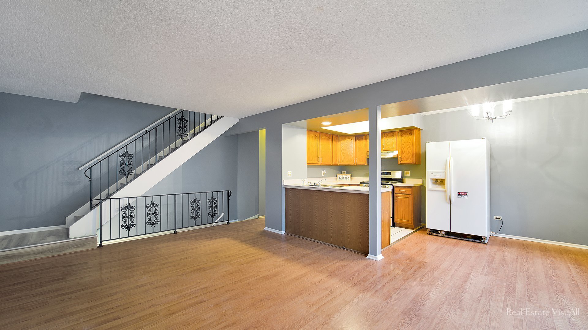 1452 Inverrary Lane Deerfield, IL 60015 - Photo 3 of 16 a view of an empty room with wooden floor and a window