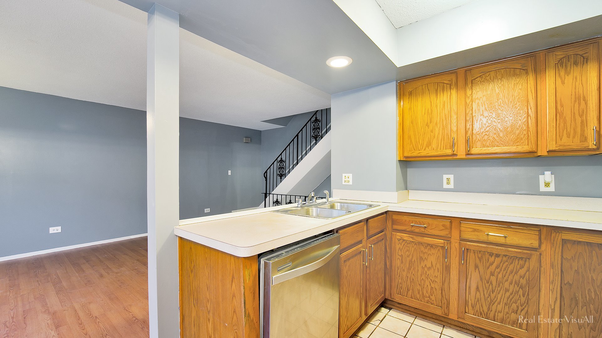1452 Inverrary Lane Deerfield, IL 60015 - Photo 6 of 16 a kitchen with a sink cabinets and window