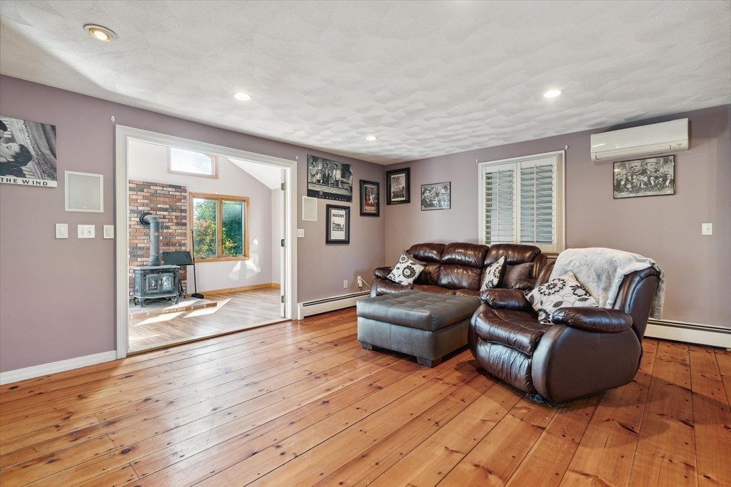 49 Dibble Road Lynn, MA 01904 - Photo 14 of 41 a living room with furniture and a wooden floor