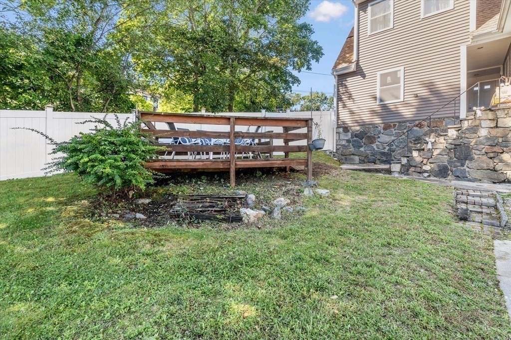 49 Dibble Road Lynn, MA 01904 - Photo 31 of 41 a view of a house with a yard