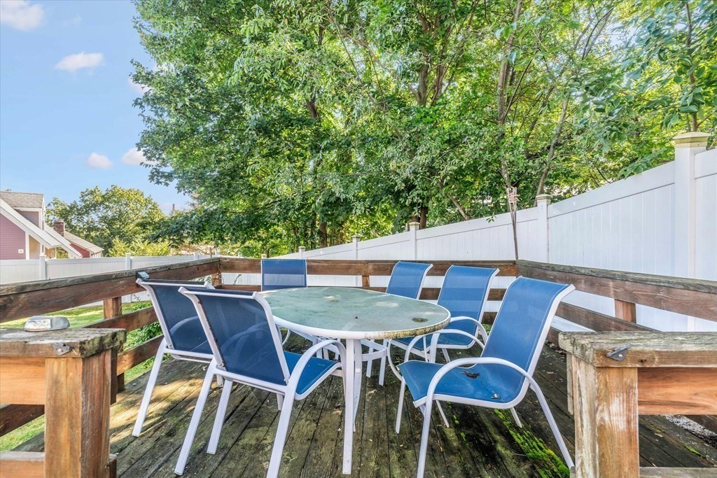 49 Dibble Road Lynn, MA 01904 - Photo 32 of 41 a patio with table and chairs