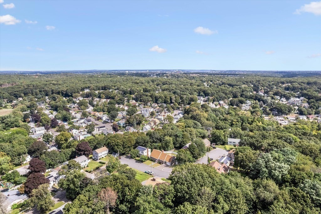 49 Dibble Road Lynn, MA 01904 - Photo 38 of 41 an aerial view of a city with lots of residential buildings and mountain view in back