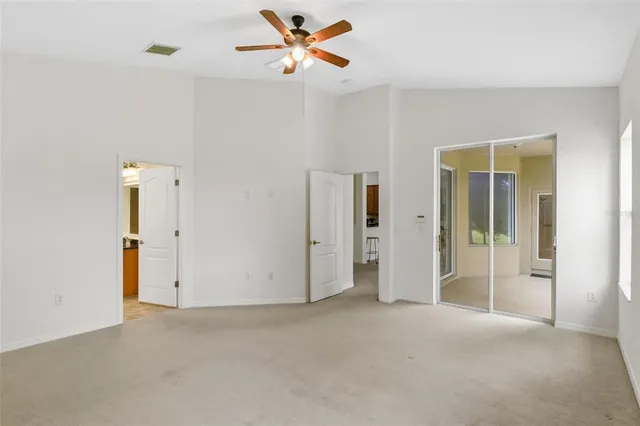 a bathroom with a sink double vanity granite tub shower and a mirror
