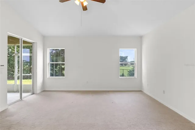 a bath tub sitting next to a bathroom sink
