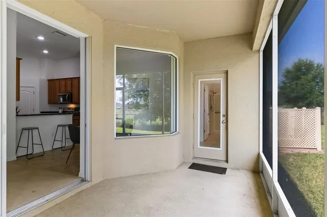 an aerial view of a house having yard