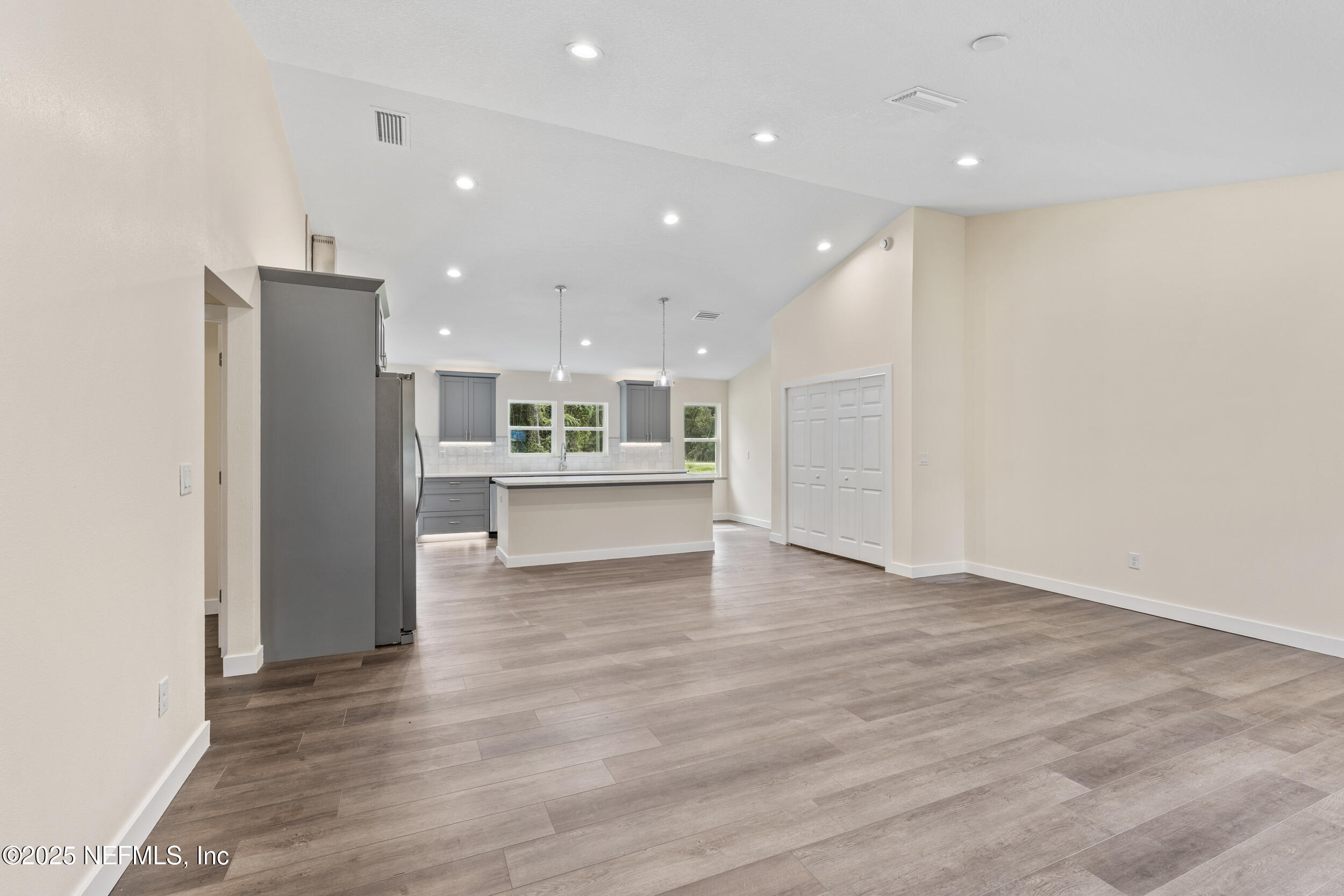 105 Southeast 3rd Street Georgetown, FL 32139 - Photo 14 of 29 a view of kitchen entryway with wooden floor