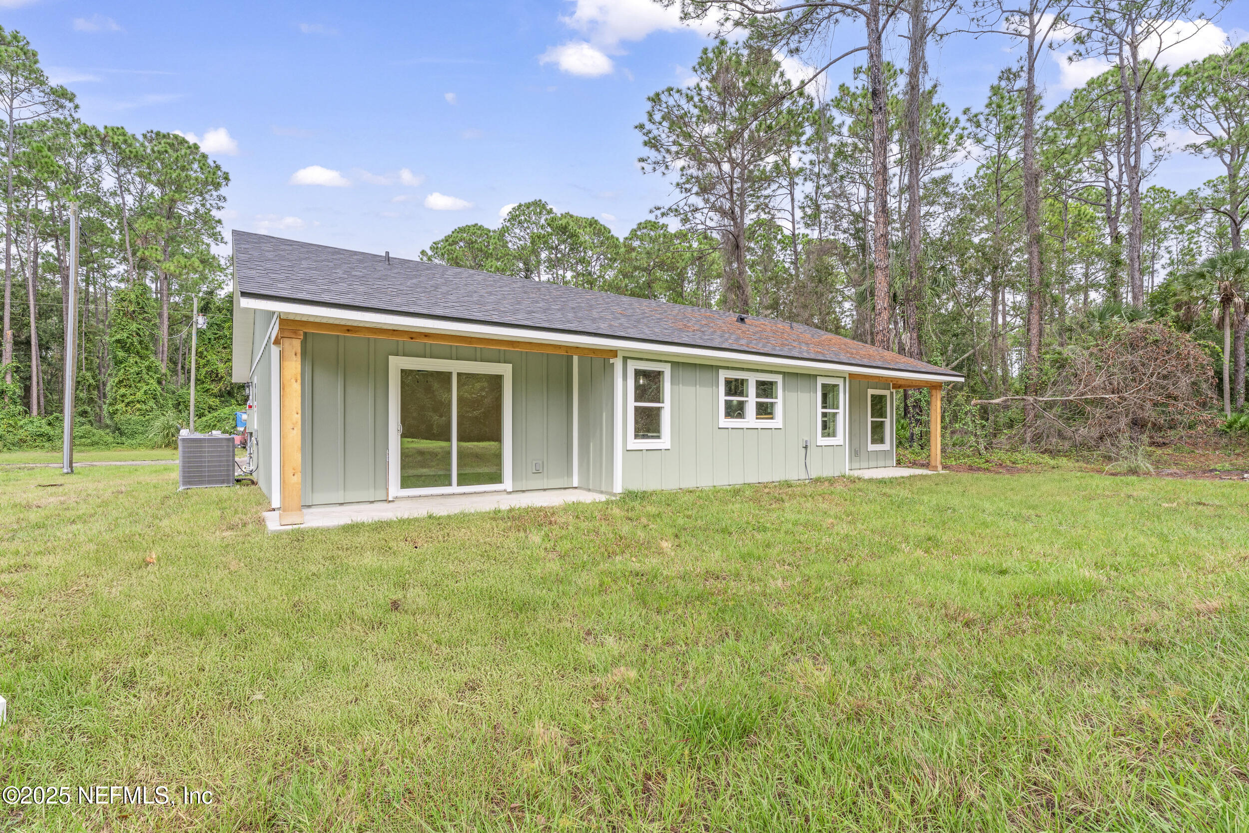 105 Southeast 3rd Street Georgetown, FL 32139 - Photo 29 of 29 a view of a house with backyard and garden