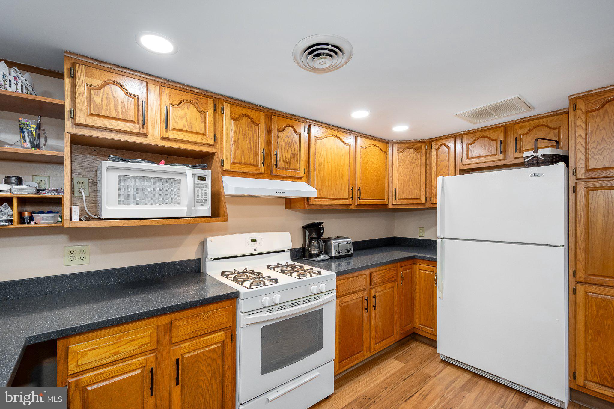 750 Lake Side Road Addison, PA 15411 - Photo 26 of 51 Warm wood tones in a cozy kitchen.