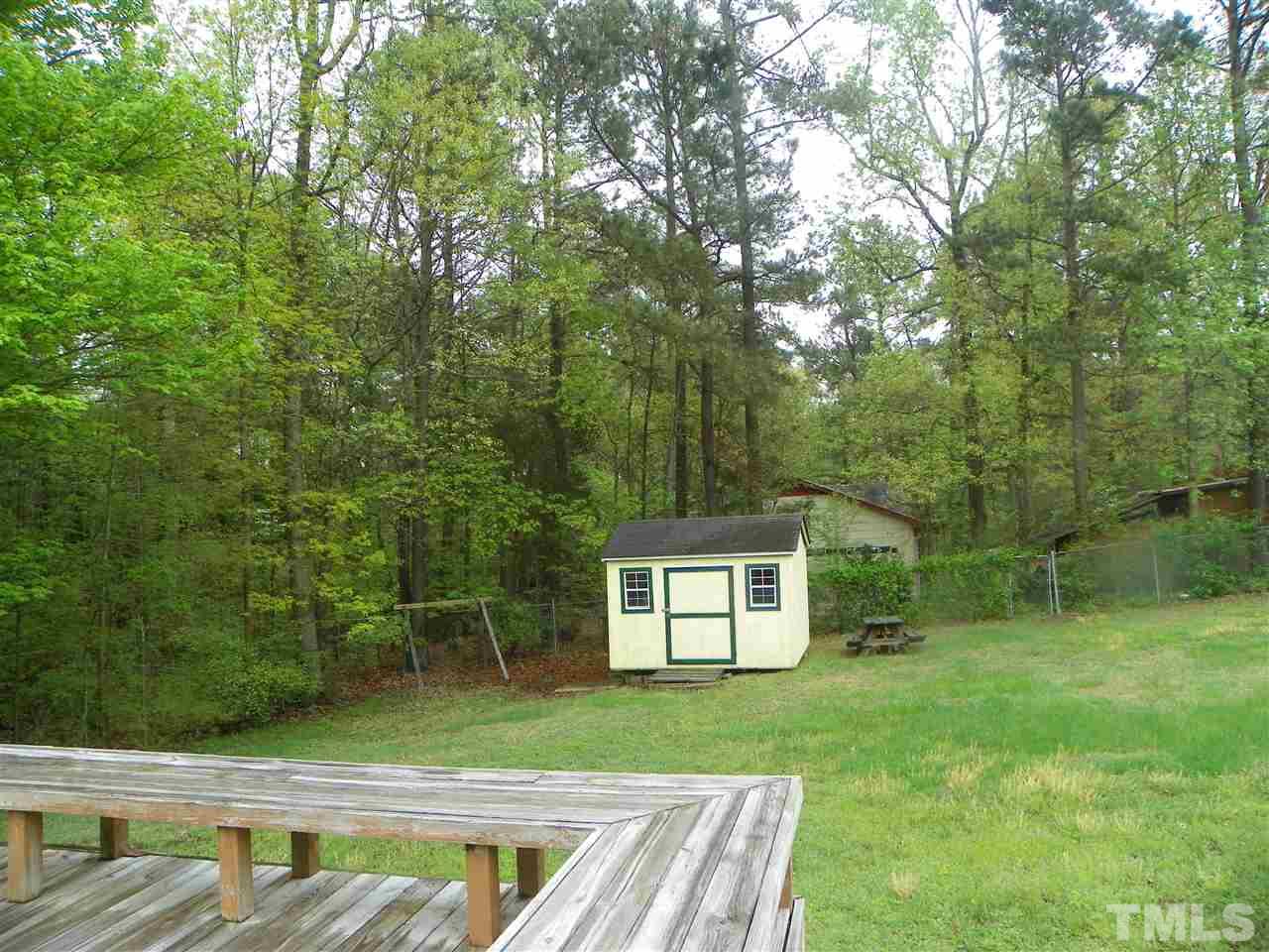 5115 McCormick Road Durham, NC 27713 - Photo 11 of 11 a view of a backyard with a small pool