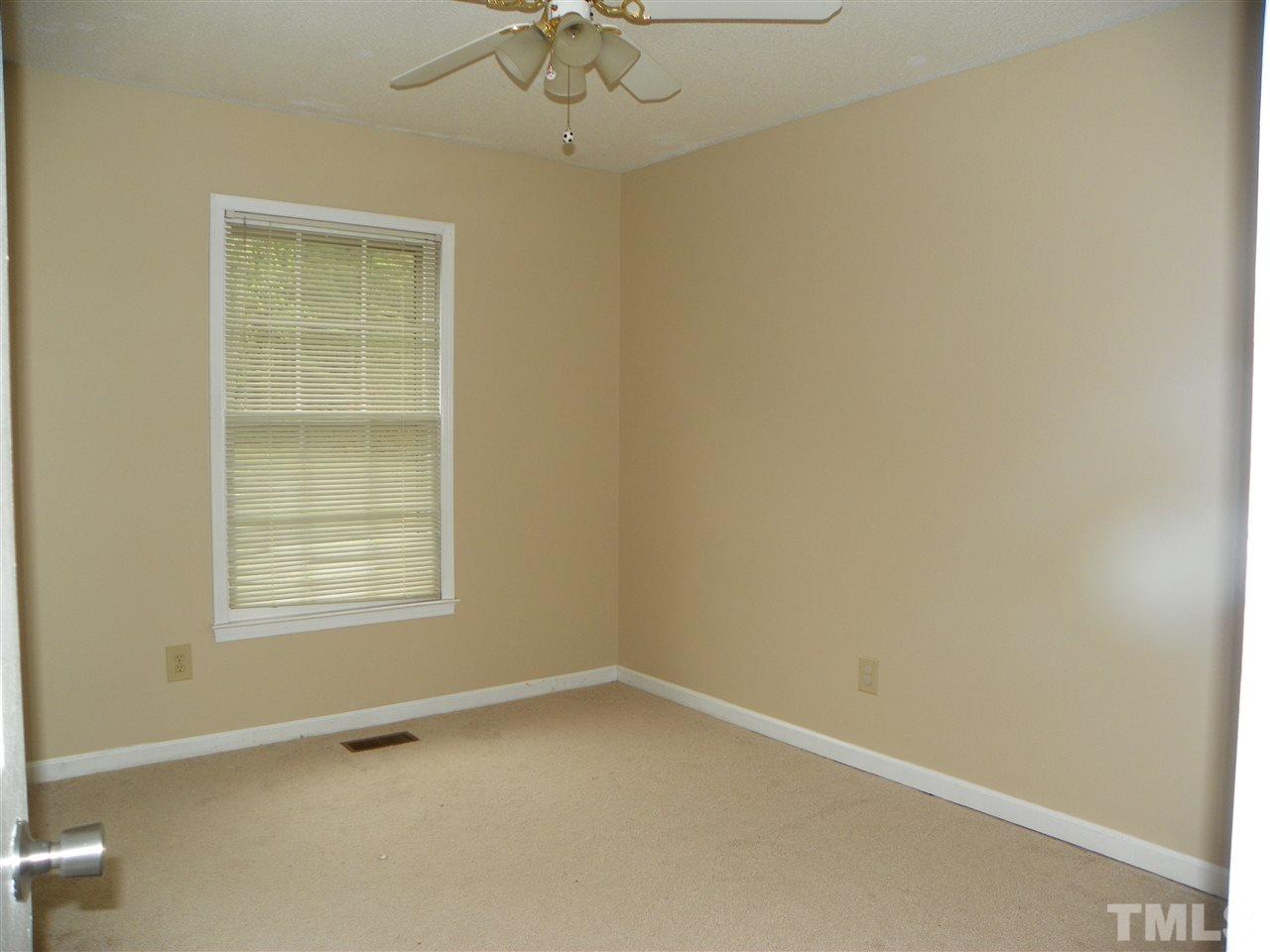 5115 McCormick Road Durham, NC 27713 - Photo 7 of 11 an empty room with a window
