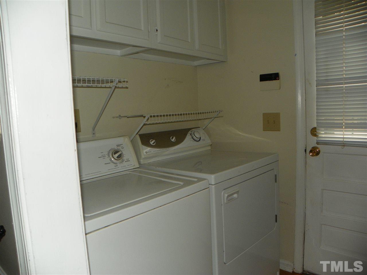 5115 McCormick Road Durham, NC 27713 - Photo 10 of 11 a utility room with dryer and washer