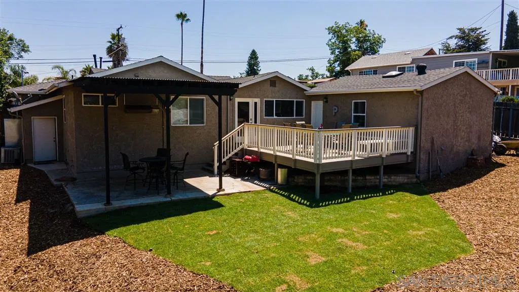 8648 Almond Road Lakeside, CA 92040 - Photo 12 of 15 a front view of house with yard outdoor seating and barbeque oven